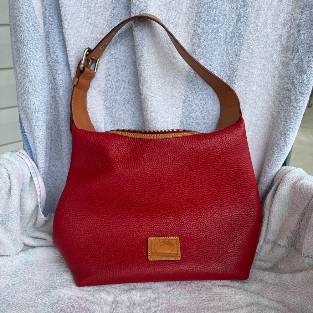 GUC Dooney & Bourke Shoulder (Hobo Style) Bag in Red Pebbled Leather.